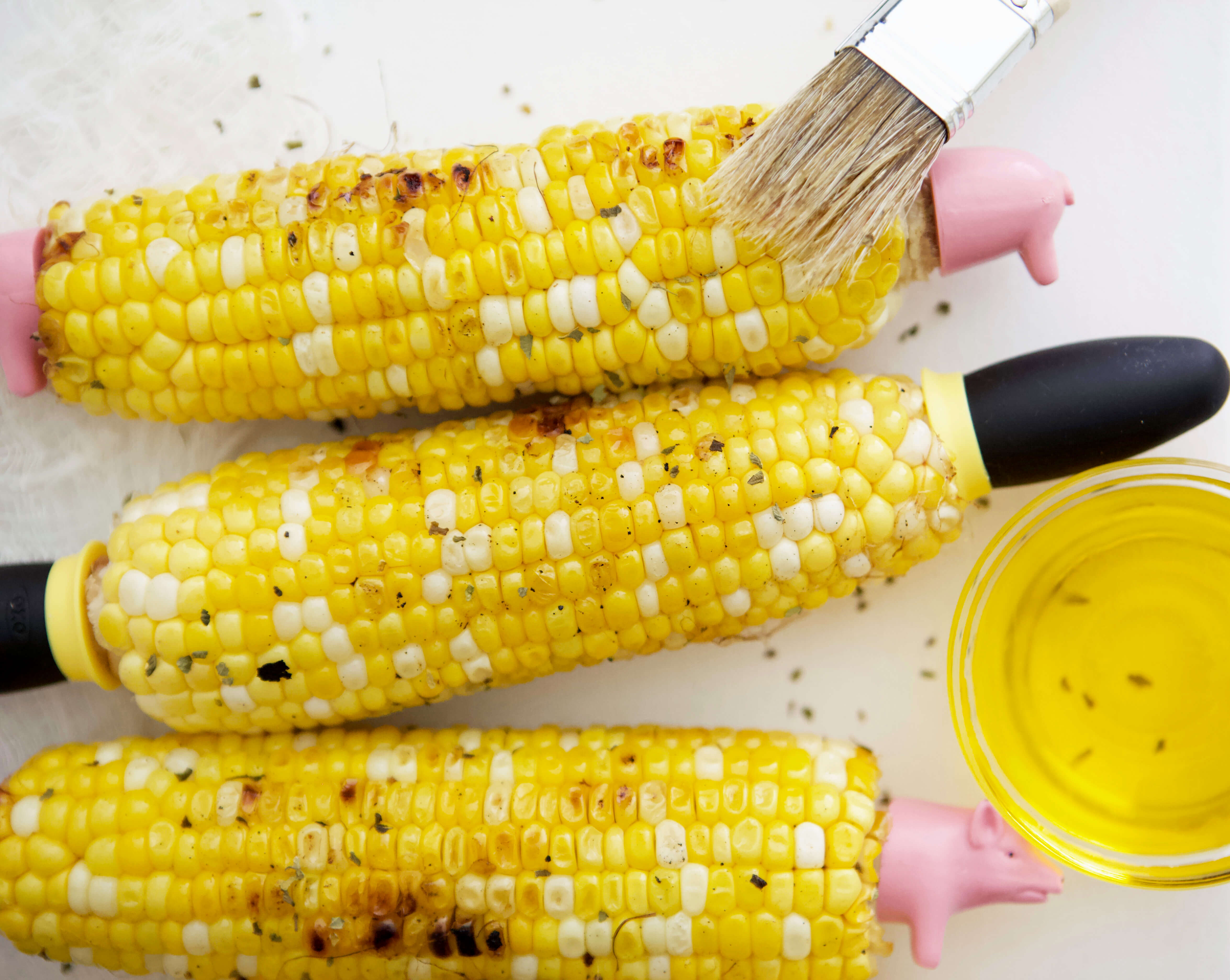 14 Food Photography Lessons Learned www.sarahkayhoffman.com #foodphotography #lifestyleblogger #contentmarketing #photography Corn on the cob with Nutiva Buttery Coconut Oil