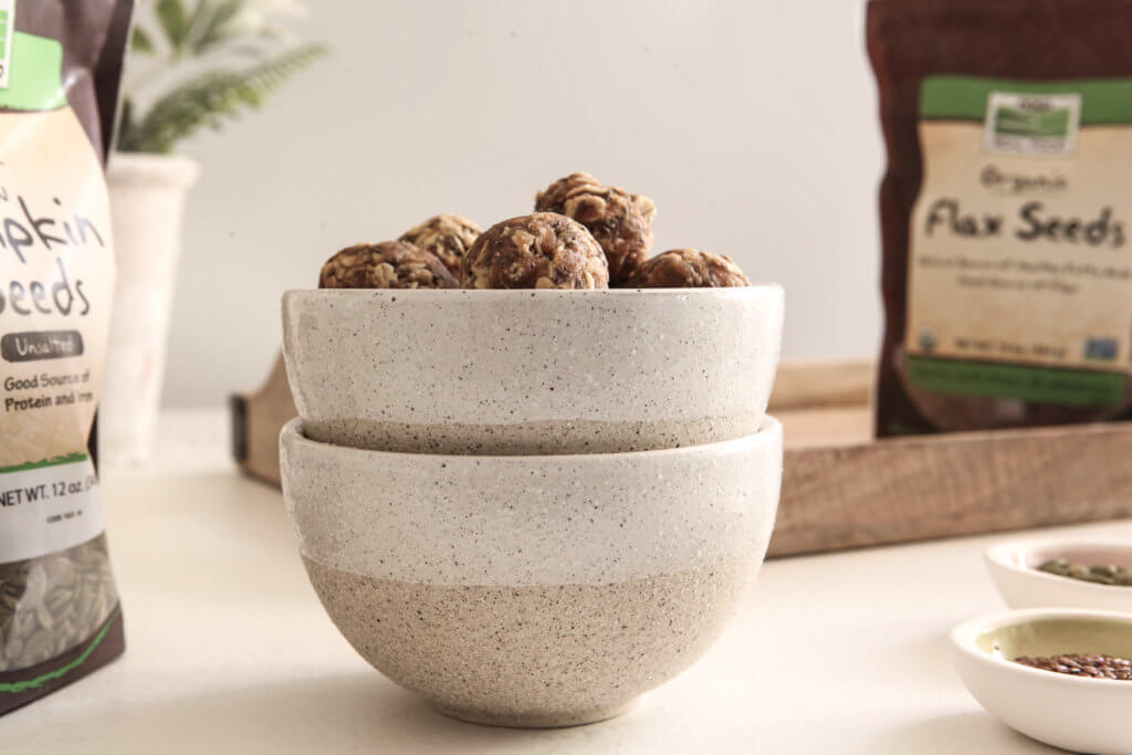 Low FODMAP Seed Cycling Energy Balls agutsygirl.com #seedcycling #lowfodmap #glutenfree #guthealth NOW Foods