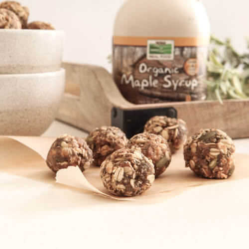 Low FODMAP Seed Cycling Energy Balls agutsygirl.com #seedcycling #lowfodmap #glutenfree #guthealth NOW Foods Organic Maple Syrup