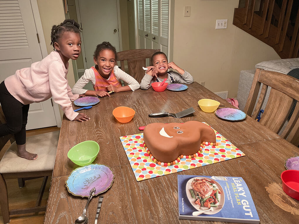 Emoji Poop Cake Party agutsygirl.com Amiya, Samarah, Isaiah #emojis #poop #leakygut #bookrelease