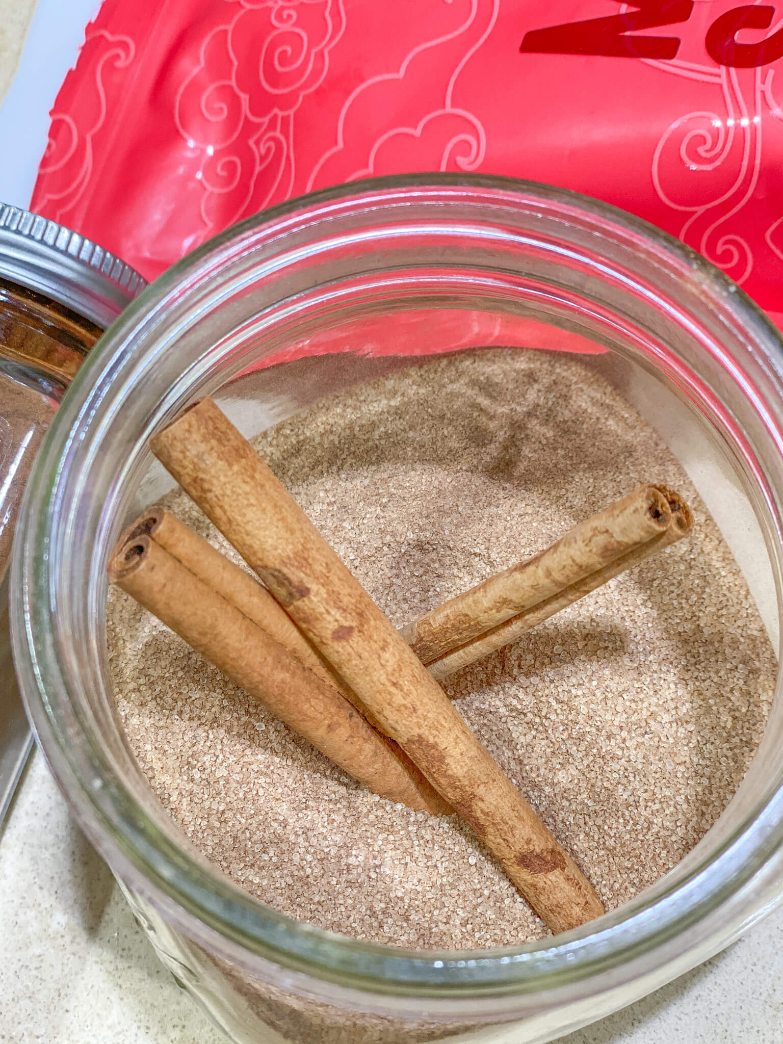 2-Ingredient No Sugar Cinnamon Sugar agutsygirl.com #nosugar #monkfruit #healthyliving #guthealth #cinnamonsugar with cinnamon sticks