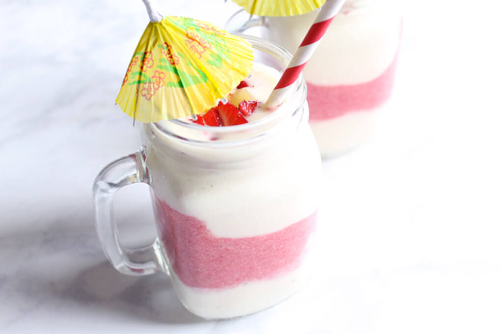 5-Ingredient Strawberry Pina Colada Smoothie Recipe agutsygirl.com #glutenfreerecipe #dairyfreerecipe #glutenfreedairyfree #smoothies recipes dairy free umbrella