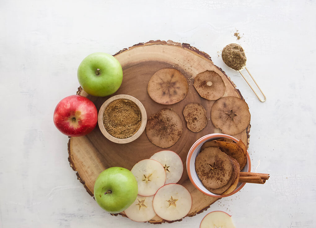 3-Ingredient Baked Apple Chips agutsygirl.com #applechips #glutenfreerecipes #apples autumn