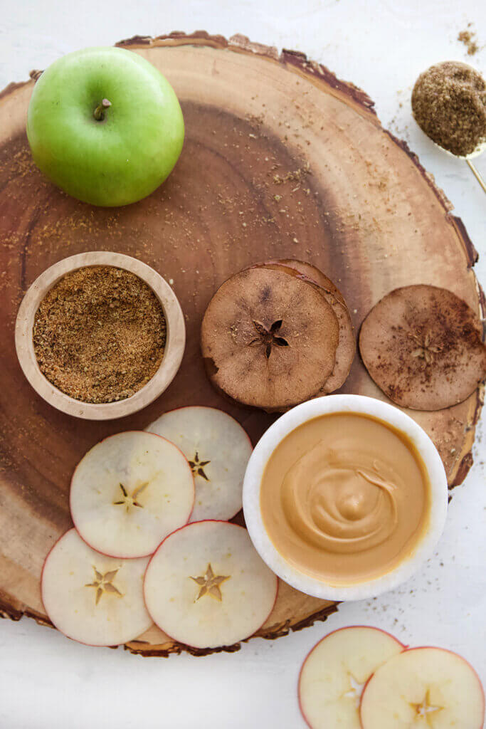 3-Ingredient Baked Apple Chips agutsygirl.com #applechips #glutenfreerecipes #apples food photography